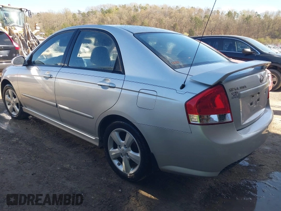 2009 Kia Spectra EX with VIN KNAFE221295026738, listed as a IAAI auction lot 41871548 with 238,130 mi miles. Bid and sale history available at carsss.com. Image 3.