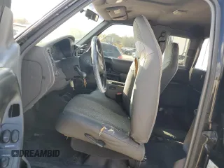 2001 Ford Ranger XLT Appearance with VIN 1FTYR14E81TA57597, listed as a Copart auction lot 45021525 with 161,838 mi miles and Salvage Title. Bid and sale history available at DreamBid. Image 7.