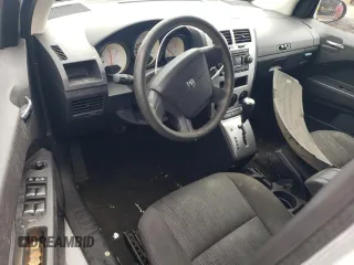 2008 Dodge Caliber SE z VIN 1B3HB28B58D753804, wystawiony jako Copart lot #56495075 z przebiegiem 177 200 mil mil oraz Szkoda całkowita • Salvage title. Historia ofert i sprzedaży dostępna na DreamBid. Obrazek 8.