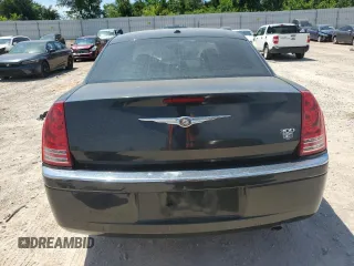 2009 Chrysler 300 with VIN 2C3KA63T39H580730, listed as a Copart auction lot 64933564 with 155,403 mi miles and Salvage Title. Bid and sale history available at carsss.com. Image 6.