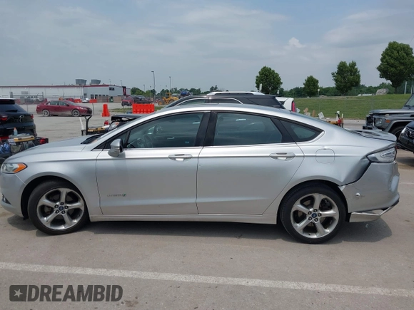 2013 Ford Fusion SE Hybrid с VIN 3FA6P0LU7DR267300, выставлен на аукционе IAAI как лот 42376940 с пробегом 148 298 миль миль и . История ставок и продаж доступна на DreamBid. Изображение 14.