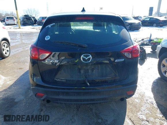 2014 Mazda CX-5 Sport with VIN JM3KE2BE7E0313978, listed as a IAAI auction lot 41437144 with 161,181 mi miles and . Bid and sale history available at carsss.com. Image 16.