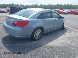 2009 Chrysler Sebring Touring z VIN 1C3LC56B89N517786, wystawiony jako IAAI lot #36918020 z przebiegiem 125 567 mil mil oraz . Historia ofert i sprzedaży dostępna na DreamBid. Obrazek 4.