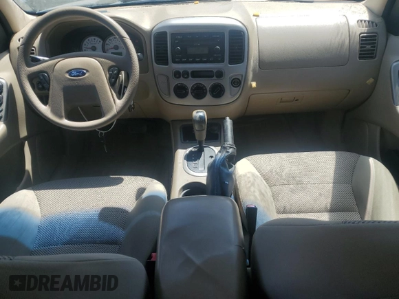 2005 Ford Escape XLT with VIN 1FMCU93105KA43061, listed as a Copart auction lot 62324555 with 121,517 mi miles and Salvage title. Bid and sale history available at DreamBid. Image 8.