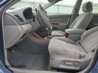 2002 Toyota Camry LE z VIN 4T1BE32K92U543686, wystawiony jako Copart lot #57792175 z przebiegiem 187 912 mil mil oraz Nie do naprawy • Non repairable. Historia ofert i sprzedaży dostępna na DreamBid. Obrazek 7.