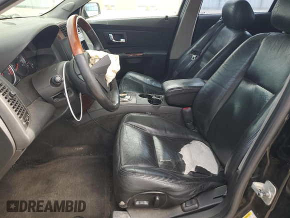2006 Cadillac CTS with VIN 1G6DP577860137082, listed as a Copart auction lot 77769444 with 220,466 mi miles and Salvage Title. Bid and sale history available at carsss.com. Image 7.