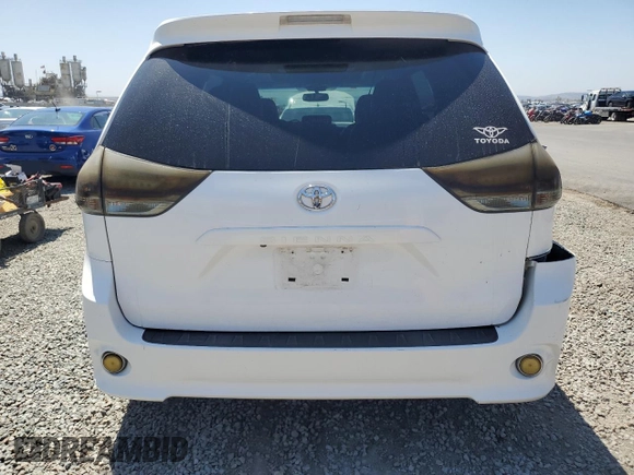 2015 Toyota Sienna SE with VIN 5TDXK3DC6FS656949, listed as a Copart auction lot 54114955 with 112,642 mi miles and Salvage Title. Bid and sale history available at DreamBid. Image 6.