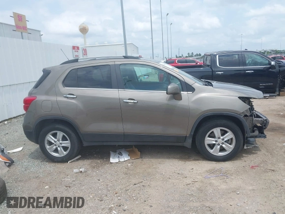 2020 Chevrolet Trax LT with VIN KL7CJLSB7LB351195, listed as a IAAI auction lot 42266365 with 64,257 mi miles and . Bid and sale history available at DreamBid. Image 14.