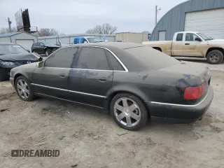 2001 Audi S8 z VIN WAUGU54DX1N012557, wystawiony jako Copart lot #85378574 z przebiegiem 102 562 mil mil oraz Tytuł czysty. Historia ofert i sprzedaży dostępna na DreamBid. Obrazek 2.