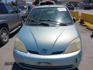 2003 Toyota Prius z VIN JT2BK12U130071262, wystawiony jako IAAI lot #42333933 z przebiegiem 314 553 mil mil oraz . Historia ofert i sprzedaży dostępna na DreamBid. Obrazek 6.