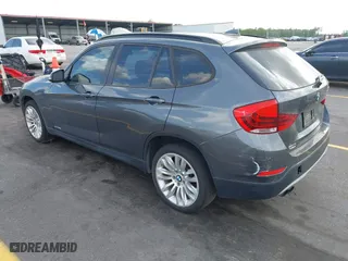 2014 BMW X1 sDrive28i with VIN WBAVM1C52EVW56134, listed as a IAAI auction lot 41941829 with 85,839 mi miles. Bid and sale history available at carsss.com. Image 3.