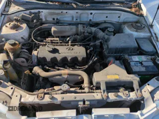 2000 Hyundai Accent z VIN KMHCG45G0YU084004, wystawiony jako Copart lot #42980585 z przebiegiem 167 545 mil mil oraz Czysty tytuł • Clean title. Historia ofert i sprzedaży dostępna na DreamBid. Obrazek 11.