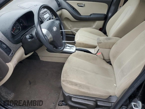 2010 Hyundai Elantra GLS with VIN KMHDU4AD6AU930974, listed as a Copart auction lot 73050024 with 76,430 mi miles and Salvage title. Bid and sale history available at DreamBid. Image 7.