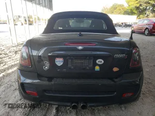 2015 MINI Roadster S z VIN WMWSY3C59FT566785, wystawiony jako Copart lot #73574064 z przebiegiem 96 623 mil mil oraz Tytuł czysty. Historia ofert i sprzedaży dostępna na DreamBid. Obrazek 6.