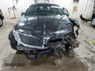 2013 Lincoln MKS with VIN 1LNHL9EK8DG611332, listed as a Copart auction lot 58043345 with 118,910 mi miles and Non repairable. Bid and sale history available at DreamBid. Image 5.