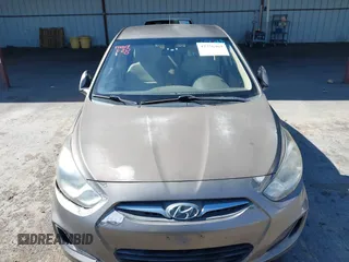 2014 Hyundai Accent GLS z VIN KMHCT4AE9EU671748, wystawiony jako IAAI lot #42356469 z przebiegiem 179 390 mil mil oraz . Historia ofert i sprzedaży dostępna na DreamBid. Obrazek 12.