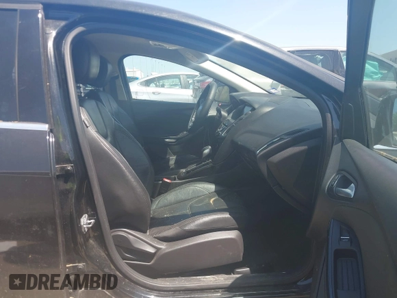 2015 Ford Focus Titanium with VIN 1FADP3J24FL385526, listed as a IAAI auction lot 42011712 with 162,696 mi miles and . Bid and sale history available at carsss.com. Image 5.