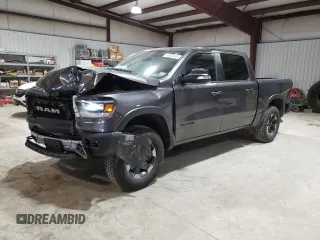 2019 Ram 1500 Rebel z VIN 1C6SRFLT4KN874338, wystawiony jako Copart lot #42096104 z przebiegiem 74 317 mil mil oraz Szkoda całkowita • Salvage title. Historia ofert i sprzedaży dostępna na DreamBid. Obrazek 1.