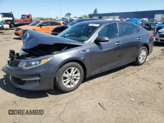 2017 Kia Optima LX z VIN KNAGT4L34H5163961, wystawiony jako Copart lot #56360165 z przebiegiem 115 293 mil mil oraz Czysty tytuł • Clean title. Historia ofert i sprzedaży dostępna na DreamBid. Obrazek 1.