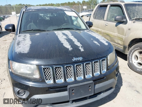 2014 Jeep Compass Latitude with VIN 1C4NJDEBXED551427, listed as a IAAI auction lot 41863047 with 75,913 mi miles. Bid and sale history available at carsss.com. Image 6.