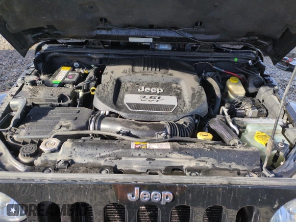 2013 Jeep Wrangler Unlimited Rubicon 10th Anniversary z VIN 1C4HJWFG6DL557085, wystawiony jako Copart lot #41693075 z przebiegiem 139 240 mil mil oraz Szkoda całkowita • Salvage title. Historia ofert i sprzedaży dostępna na DreamBid. Obrazek 11.