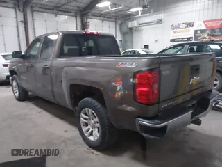 2014 Chevrolet Silverado 1500 LT with VIN 1GCVKREC9EZ240612, listed as a IAAI auction lot 41108566 with 200,625 mi miles and . Bid and sale history available at DreamBid. Image 3.