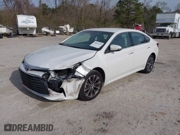 2016 Toyota Avalon Limited with VIN 4T1BK1EB8GU227552, listed as a IAAI auction lot 41857342 with 164,546 mi miles and . Bid and sale history available at carsss.com. Image 2.