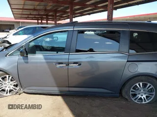 2012 Honda Odyssey EX-L with VIN 5FNRL5H6XCB103498, listed as a IAAI auction lot 42065658 with 104,933 mi miles and . Bid and sale history available at carsss.com. Image 14.