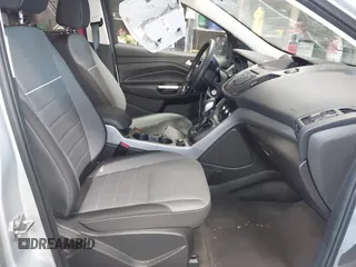 2015 Ford Escape SE with VIN 1FMCU0GX4FUC22042, listed as a IAAI auction lot 42094798 with 35,407 mi miles and . Bid and sale history available at DreamBid. Image 5.