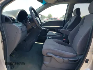 2007 Honda Odyssey LX with VIN 5FNRL38287B054504, listed as a Copart auction lot 59141665 with 128,617 mi miles and Salvage title. Bid and sale history available at DreamBid. Image 7.
