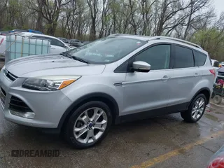 2015 Ford Escape Titanium with VIN 1FMCU9JX2FUA24279, listed as a IAAI auction lot 41930868 with 254,997 mi miles. Bid and sale history available at carsss.com. Image 15.