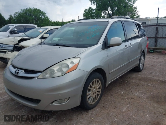 2007 Toyota Sienna XLE z VIN 5TDBK22C07S005499, wystawiony jako IAAI lot #42304686 z przebiegiem 179 721 mil mil oraz . Historia ofert i sprzedaży dostępna na DreamBid. Obrazek 2.