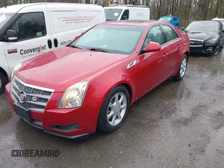 2009 Cadillac CTS AWD w/1SB with VIN 1G6DS57V490128140, listed as a IAAI auction lot 42001773 with 95,597 mi miles. Bid and sale history available at carsss.com. Image 2.