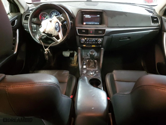 2016 Mazda CX-5 Grand Touring with VIN JM3KE4DY8G0755982, listed as a Copart auction lot 43391165 with 92,427 mi miles and Salvage Title. Bid and sale history available at carsss.com. Image 8.