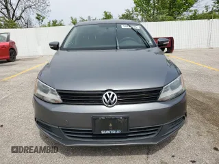 2012 Volkswagen Jetta TDI w/Premium & Nav z VIN 3VWLL7AJ8CM319746, wystawiony jako Copart lot #54313335 z przebiegiem 186 003 mil mil oraz Czysty tytuł • Clean title. Historia ofert i sprzedaży dostępna na DreamBid. Obrazek 5.