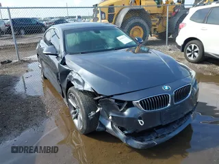 2015 BMW 4 Series 428i with VIN WBA4A5C51FG051247, listed as a IAAI auction lot 42393472 with 107,804 mi miles and . Bid and sale history available at DreamBid. Image 1.