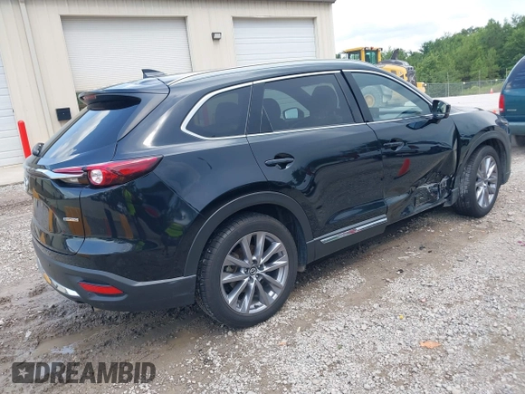 2022 Mazda CX-9 Grand Touring with VIN JM3TCBDYXN0627657, listed as a IAAI auction lot 42498856 with 61,044 mi miles and . Bid and sale history available at DreamBid. Image 4.