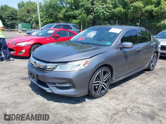 2016 Honda Accord Touring with VIN 1HGCR3F94GA009459, listed as a IAAI auction lot 42597128 with 182,977 mi miles and . Bid and sale history available at DreamBid. Image 2.