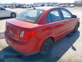 2011 Kia Rio LX with VIN KNADH4A34B6848891, listed as a IAAI auction lot 41678155 with 152,021 mi miles. Bid and sale history available at carsss.com. Image 4.