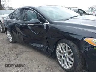 2014 Ford Fusion Titanium with VIN 3FA6P0K92ER355539, listed as a IAAI auction lot 41851471 with 178,176 mi miles and . Bid and sale history available at DreamBid. Image 6.