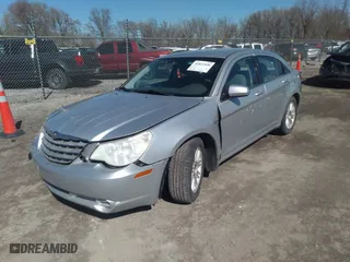 2008 Chrysler Sebring Touring with VIN 1C3LC56K78N275328, listed as a IAAI auction lot 41811526 with 195,457 mi miles. Bid and sale history available at carsss.com. Image 22.