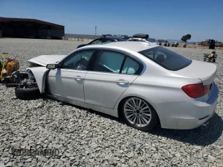 2014 BMW 3 Series 328i with VIN WBA3C1C53EK112799, listed as a Copart auction lot 61493585 with Not provided miles and Salvage title. Bid and sale history available at DreamBid. Image 2.
