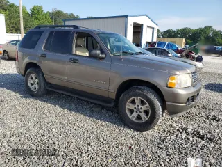 2005 Ford Explorer XLT with VIN 1FMZU63K25UA96267, listed as a Copart auction lot 56800105 with 255,774 mi miles and Salvage title. Bid and sale history available at DreamBid. Image 4.