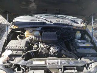 2003 Jeep Liberty Sport with VIN 1J4GK48K63W581392, listed as a Copart auction lot 75529424 with 182,982 mi miles and Salvage Title. Bid and sale history available at DreamBid. Image 11.