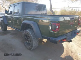 2021 Jeep Gladiator Mojave with VIN 1C6JJTEG8ML606876, listed as a IAAI auction lot 41632052 with 30,255 mi miles and . Bid and sale history available at DreamBid. Image 3.
