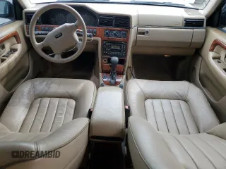 1997 Volvo 960 z VIN YV1KW9602V1042720, wystawiony jako Copart lot #70426274 z przebiegiem 68 087 mil mil oraz Szkody całkowita. Historia ofert i sprzedaży dostępna na DreamBid. Obrazek 8.
