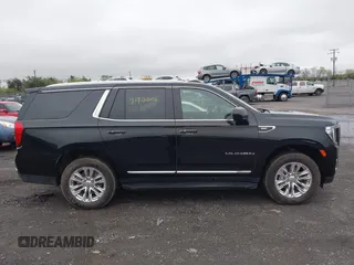 2024 GMC Yukon SLT with VIN 1GKS1BKD5RR209037, listed as a IAAI auction lot 41974006 with 36,918 mi miles. Bid and sale history available at carsss.com. Image 13.