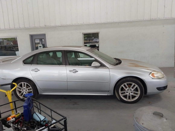 2015 Chevrolet Impala LTZ with VIN 2G1WC5E39F1115364, listed as a IAAI auction lot 42152951 with 122,335 mi miles and . Bid and sale history available at DreamBid. Image 13.