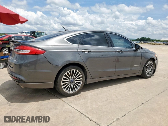 2017 Ford Fusion Hybrid Titanium with VIN 3FA6P0RU1HR368930, listed as a Copart auction lot 64965075 with 180,607 mi miles and Clean title. Bid and sale history available at DreamBid. Image 3.