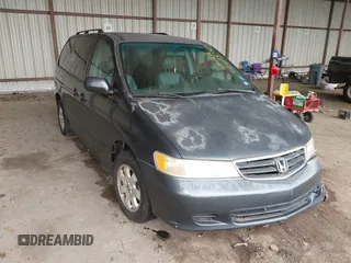 2003 Honda Odyssey EX-L with VIN 5FNRL18983B102336, listed as a IAAI auction lot 42278340 with 157,986 mi miles and . Bid and sale history available at DreamBid. Image 1.